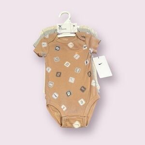 Nike Tan Graphic Baby One-Piece Bodysuit